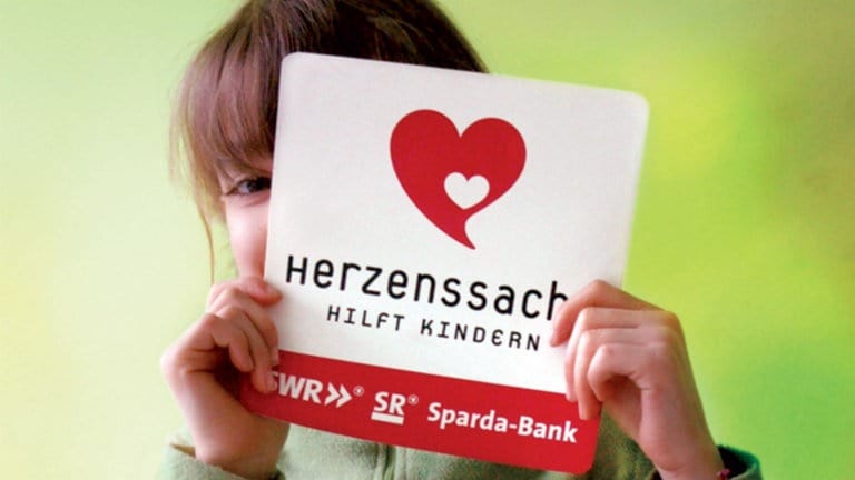Mädchen mit Herzenssache-Logo (Foto: Herzenssache)