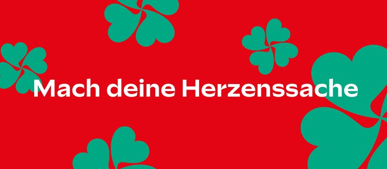 Mach deine Herzenssache Schriftzug auf rotem Hintergrund (Foto: Herzenssache)