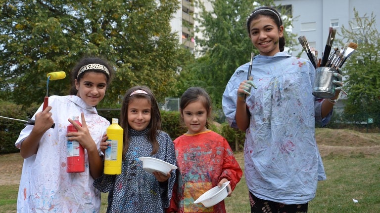 vier künstlerische Kinder
