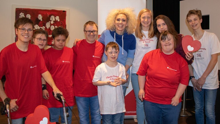 Foto: Herzenssache "Musical in Concert"-Darsteller treffen Herzenssache-Projekt (Foto: Herzenssache)