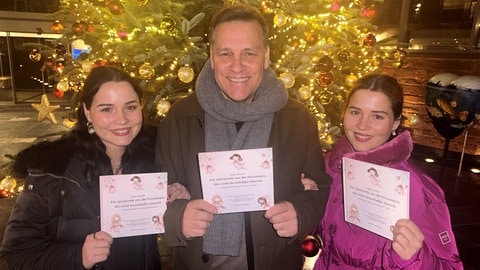 Holger Wienpahl und seine Töchter (Foto: Herzenssache e.V.) Holger Wienpahl und seine Töchter