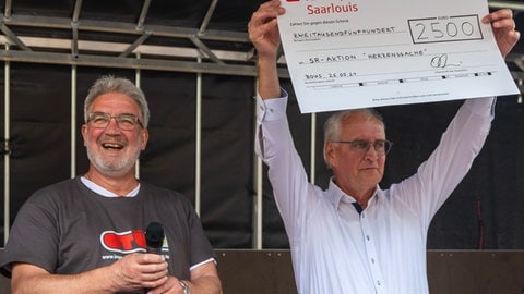 Scheckübergabe an Herzenssache (Foto: SR) Scheckübergabe an Herzenssache